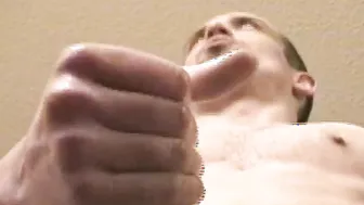 Slender stud spills load after stroking big dick