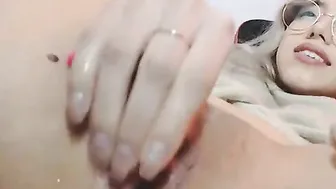 Petite Chick with glasses masturbates