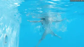 Captivating Bonnie Dolce swimming naked
