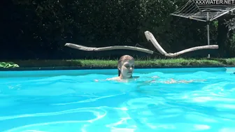 Captivating Bonnie Dolce swimming naked