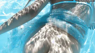 Captivating Bonnie Dolce swimming naked