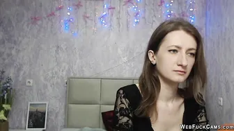 Brunette babe fondles tit on webcam solo live show