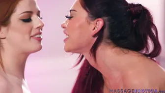 Lesbian masseuse gives redhead a fingering massage