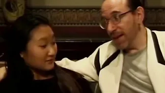 Sensual Asian teen has her ass fucked by two guys on couch