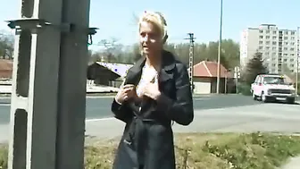 Sexy blonde urinating on road