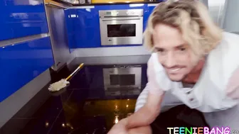 Hardworking young lady cleans the kitchen before pounding