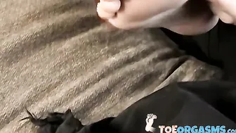 Skinny twink massages his feet and strokes massive dick