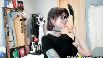 While Watching porn video – Tattooed Woman slides Her Fingers deep into Her Wet Pussy