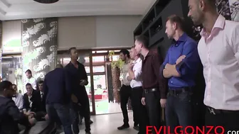 Naughty bitches go wild with horny hunks in massive orgy