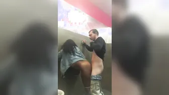 African cunt with mouth fucks white dick into club toilet