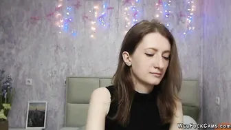 Brunette babe strips to bra on webcam solo show