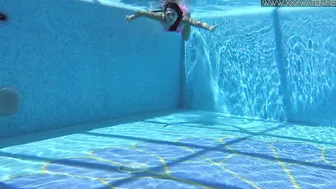 Russian petite tight babe Lincoln nude in pool