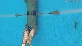 Absolutely astonishing blonde pornstar Mary Kalisy swimming