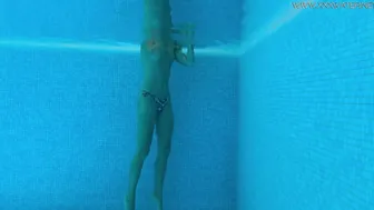 Absolutely astonishing blonde pornstar Mary Kalisy swimming