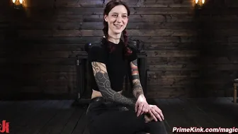 Redhead bound in a bridge position whipped