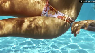Small tits blonde babe Sofie Otis swimming naked