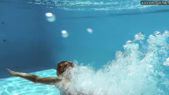 Small tits blonde babe Sofie Otis swimming naked