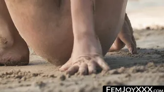 Natalia an exotic cutie having fun on a sandy beach