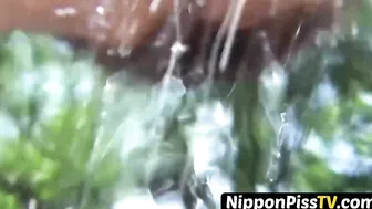 Debaucherous Asian student peeing hard out in the open