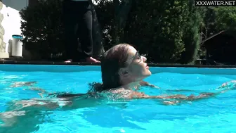 Busty milf Angelica by the pool