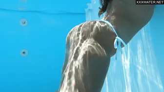 Busty milf Angelica by the pool