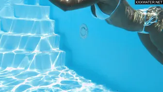 Busty milf Angelica by the pool