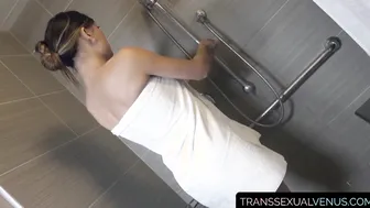 Enormous tits tranny Venus Lux jerks off while washing herself