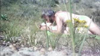 ALONE AND NUDE WOMAN ON BEACH