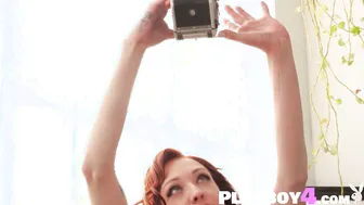 Redhead teen model enjoys hot posing