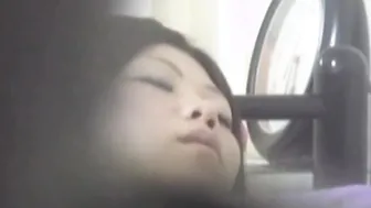 Voyeur Japanese lass relaxes while touching her wet pussy