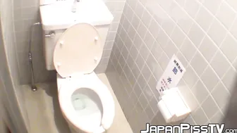 Japanese women piss in a bathroom with an up close camera