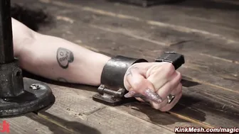 Babe bound in chains to a post