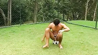Horny Brazilian jock jerking off his throbbing cock outdoors