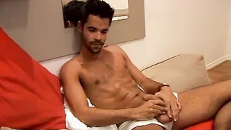 Inked hunk jerking off with fleshlight while watching porn