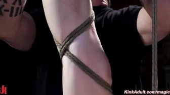 Redhead slave bound in a suspension by master