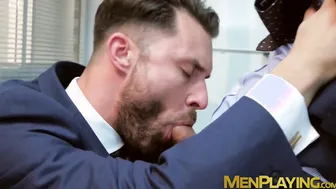 Men in suits enjoy a rough session of steamy sex at work