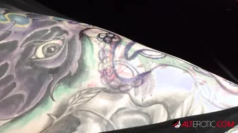 Marie Bossette getting a painful tattoo on her leg