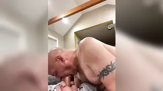 Sucking on a big dildo
