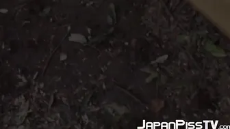 Voluptuous Japanese is pulling down her panties and peeing
