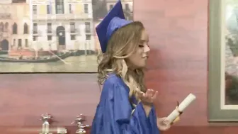 Graduation Day - college girl Graduate Gets Her Diploma Signed With Love