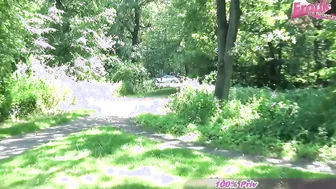 Red-haired girl Jenny Berger outdoors in a dress