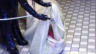 Mistress in latex punish her slaves