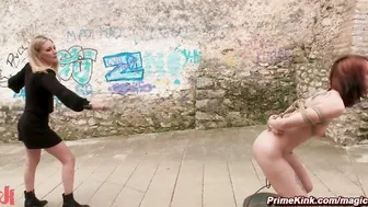 Lilyan Red in a cruel lezdom outdoors
