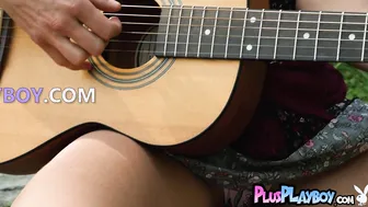 Sweet blonde musician posing outdoor