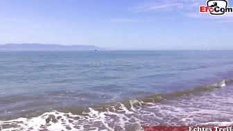 Fucking a teen outside on the public beach