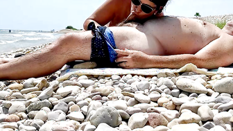 Sexy mom in the beach