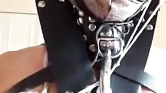 Angela dangles from the ceiling and whipped