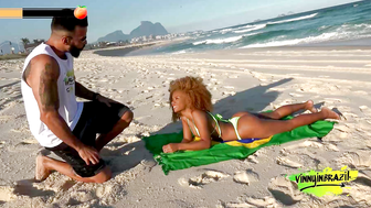 Naughty brunette seduced by porn actor on deserted beach
