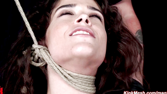 Brunette tied in chair and tormented