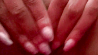 Tiny Trisha rubbing and fingering pussy